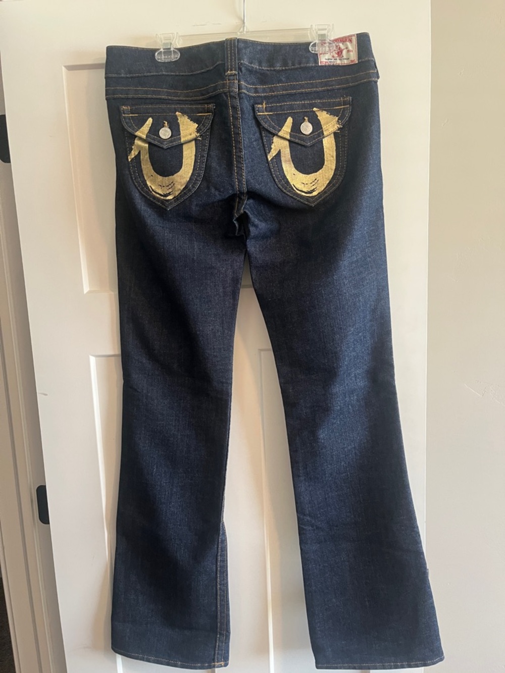 True Religion Dark Blue Flared Jeans with Gold Back Pocket Detail